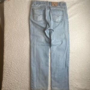 Vintage Levi's 509 men's light wash USA made jeans straight loose fit 34x31